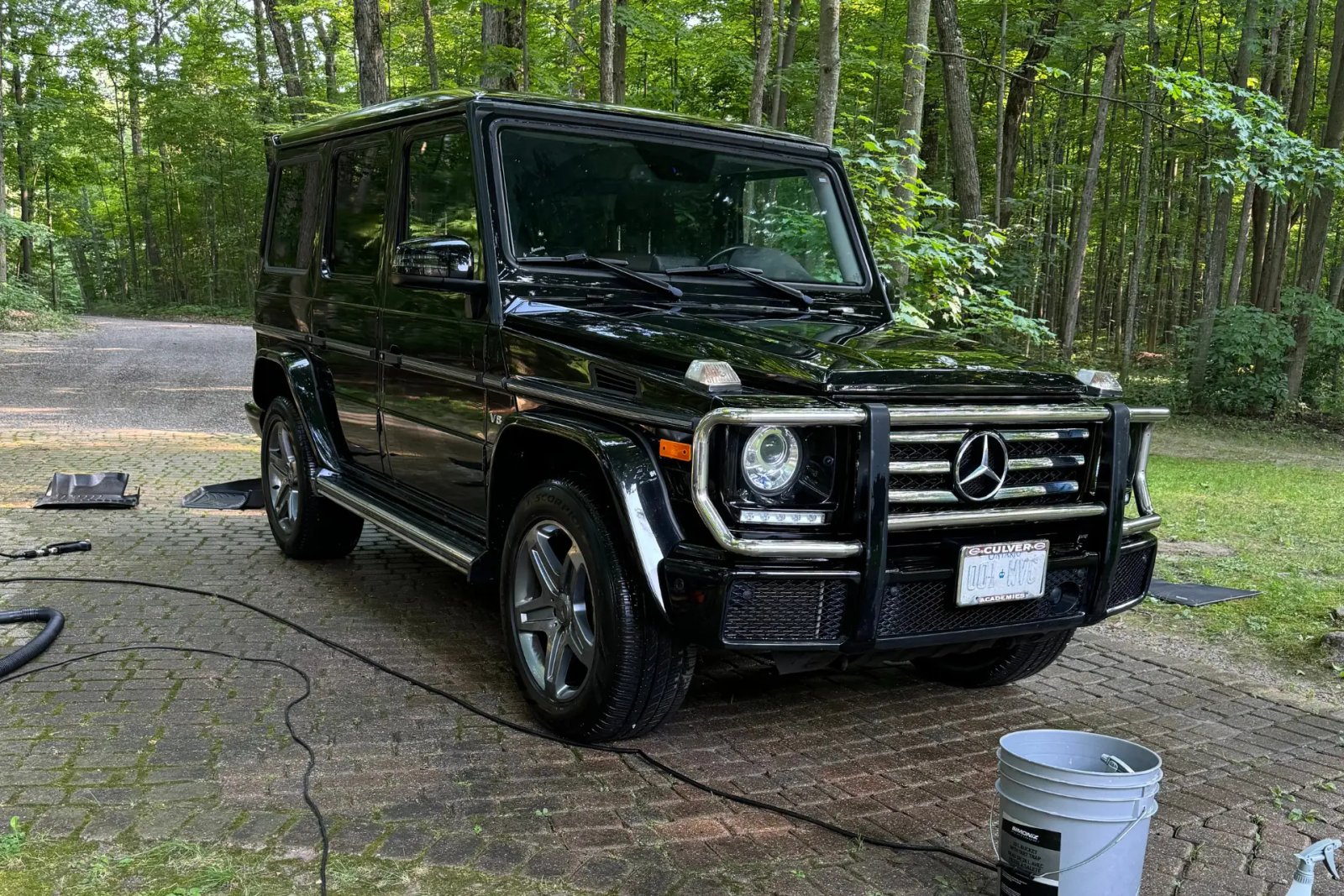 Black Mercedes G-Wagon parked on driveway, ready for car detailing service